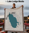 Woven blanket featuring a teal outline of Black Lake, New York.