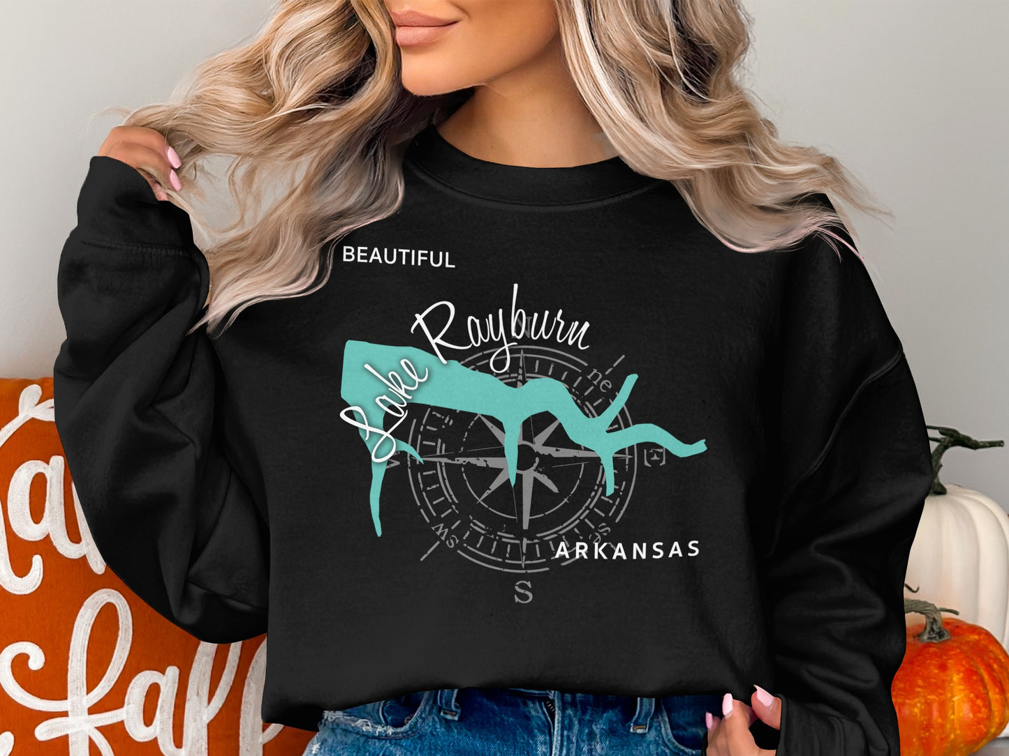 Black sweatshirt with "Lake Rayburn Arkansas" and compass graphic.