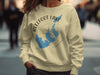 Cream sweatshirt with Reelfoot Lake Tennessee map and compass graphic.