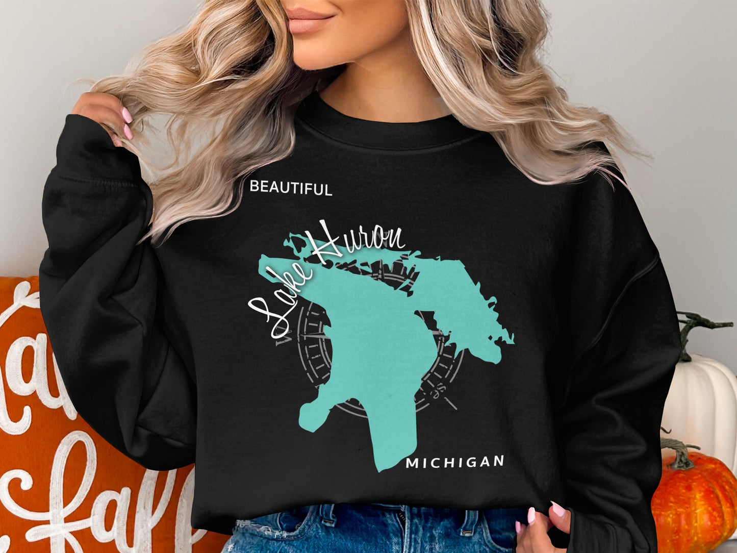 Black sweatshirt with "Beautiful Lake Huron Michigan" map graphic and compass rose.