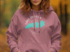 Pink hoodie with Lake America compass and map graphic on chest.