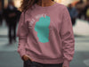 Dusty rose sweatshirt with teal Lake Tahoe map graphic and compass rose design.