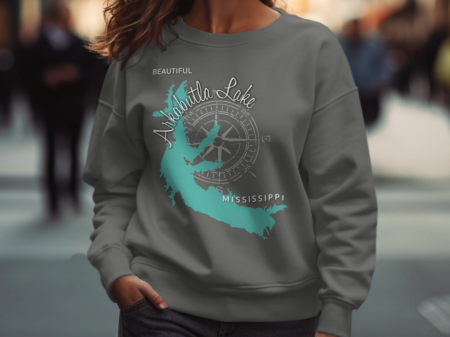 Grey sweatshirt with Arkabutla Lake, Mississippi map graphic and compass.