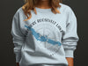 Light blue sweatshirt with Theodore Roosevelt Lake, Arizona and compass graphic.