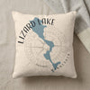Pillow with Lizard Lake Minnesota map and compass design.
