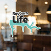 Rayburn Life logo in black and teal on a glass surface.