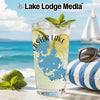 Glass with drink and lake map design, beach background, sunglasses.