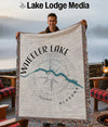 Woven blanket with Wheeler Lake Alabama map and compass design.