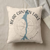 Cream pillow with Bear Canyon Lake Arizona map and compass graphic.