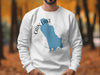 White sweatshirt with a blue map of Cain Lake Washington and compass graphic.