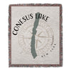 Woven blanket with "Conesus Lake New York" text, lake outline, and compass rose.