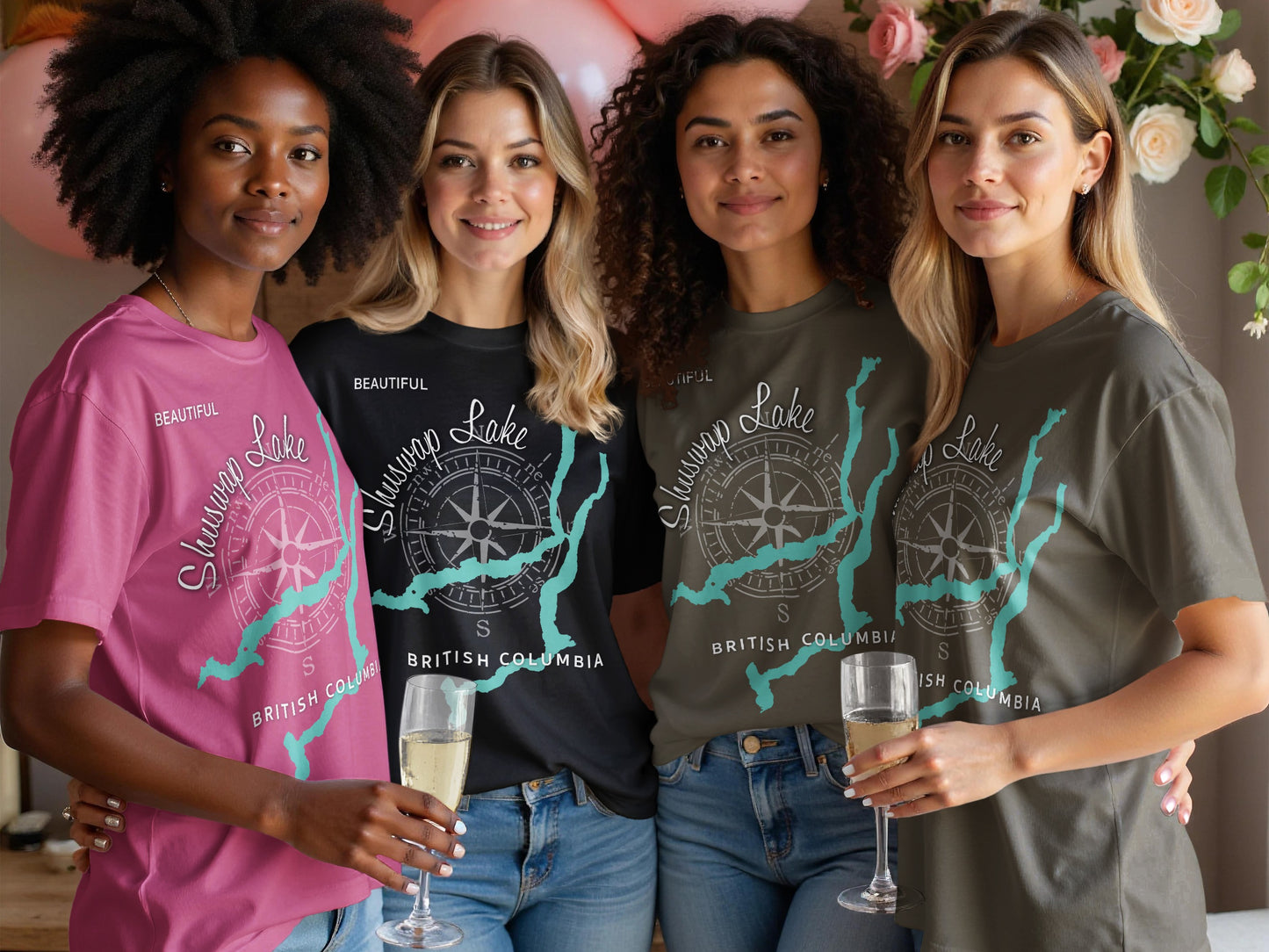 Four women in matching t-shirts featuring a compass and Shuswap Lake map.