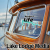 Sticker on boat window says "Rayburn Life"; "Lake Lodge Media" text at bottom.