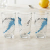 Three clear glasses with blue Lake Las Vegas maps and compass rose designs.