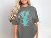 Gray t-shirt with white text and a teal lake graphic.
