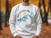 White sweatshirt with Douglas Lake Tennessee map and compass graphic.