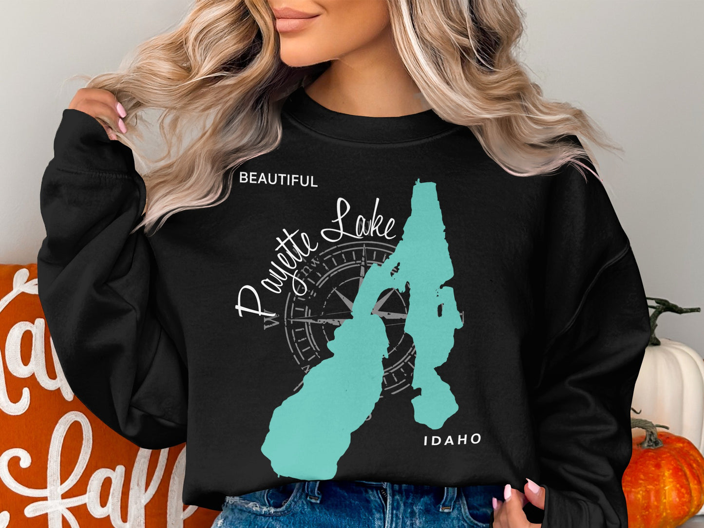 Black sweatshirt with a teal map outline of Payette Lake, Idaho and compass rose.