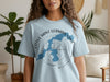Light blue t-shirt with a compass graphic of Little Saint Germain Lake, Wisconsin