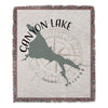 Woven blanket with Canyon Lake Arizona map and compass design.