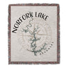 Throw blanket featuring a map of Norfolk Lake, Arkansas, with a compass rose.