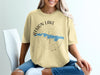 Atsion Lake New Jersey graphic on a tan t-shirt with compass and lake outline.