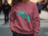 Pink sweatshirt with a teal map of Lake Wawasee, Indiana.