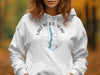 White hoodie with Lake Blackshear Georgia compass design on front.