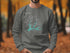Dark grey sweatshirt with "Beautiful Lake Shasta California" and compass design.