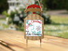 Wooden sled ornament with "Merry Christmas from Lake Granbury" text.