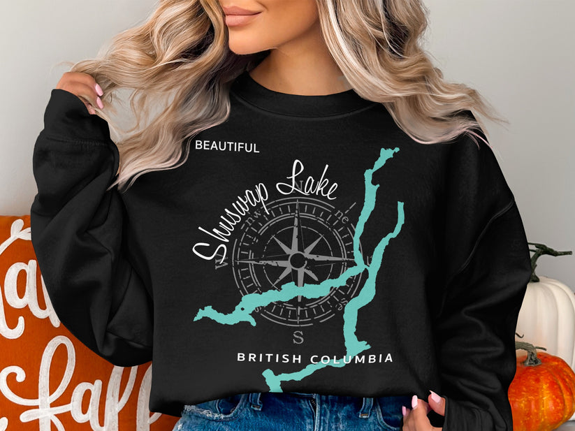 Black sweatshirt with "Beautiful Shuswap Lake British Columbia" and compass design.