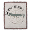 Woven blanket with a compass rose and North Channel, Ontario map design.