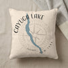 Cream pillow with Cayuga Lake map, compass rose, and New York text.