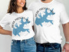 White t-shirts with blue Herb Parsons Lake Tennessee graphic and text.