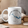 White mug with Woods Canyon Lake Arizona graphic and compass rose.