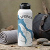 White water bottle with black lid labeled "NEW SPRINGS" and a compass design.