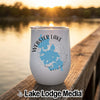 A white stainless steel tumbler featuring a blue map of Webster Lake, Massachusetts, resting on a wooden dock.