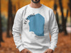 White sweatshirt with blue Red Lake Minnesota graphic and compass detail.