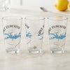 Three clear glasses with "Lake Ouachita Arkansas" and a blue lake map design.