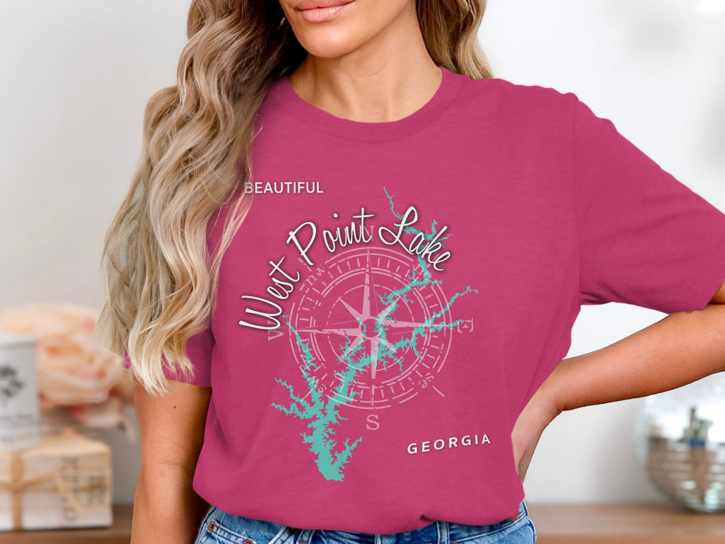Pink t-shirt with a compass rose graphic and "Beautiful West Point Lake Georgia" text.