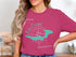 Pink t-shirt featuring a compass rose and the text "Beautiful Lake Crescent Washington".