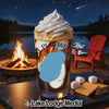 Glass of iced drink with whipped cream, beside s'mores ingredients.