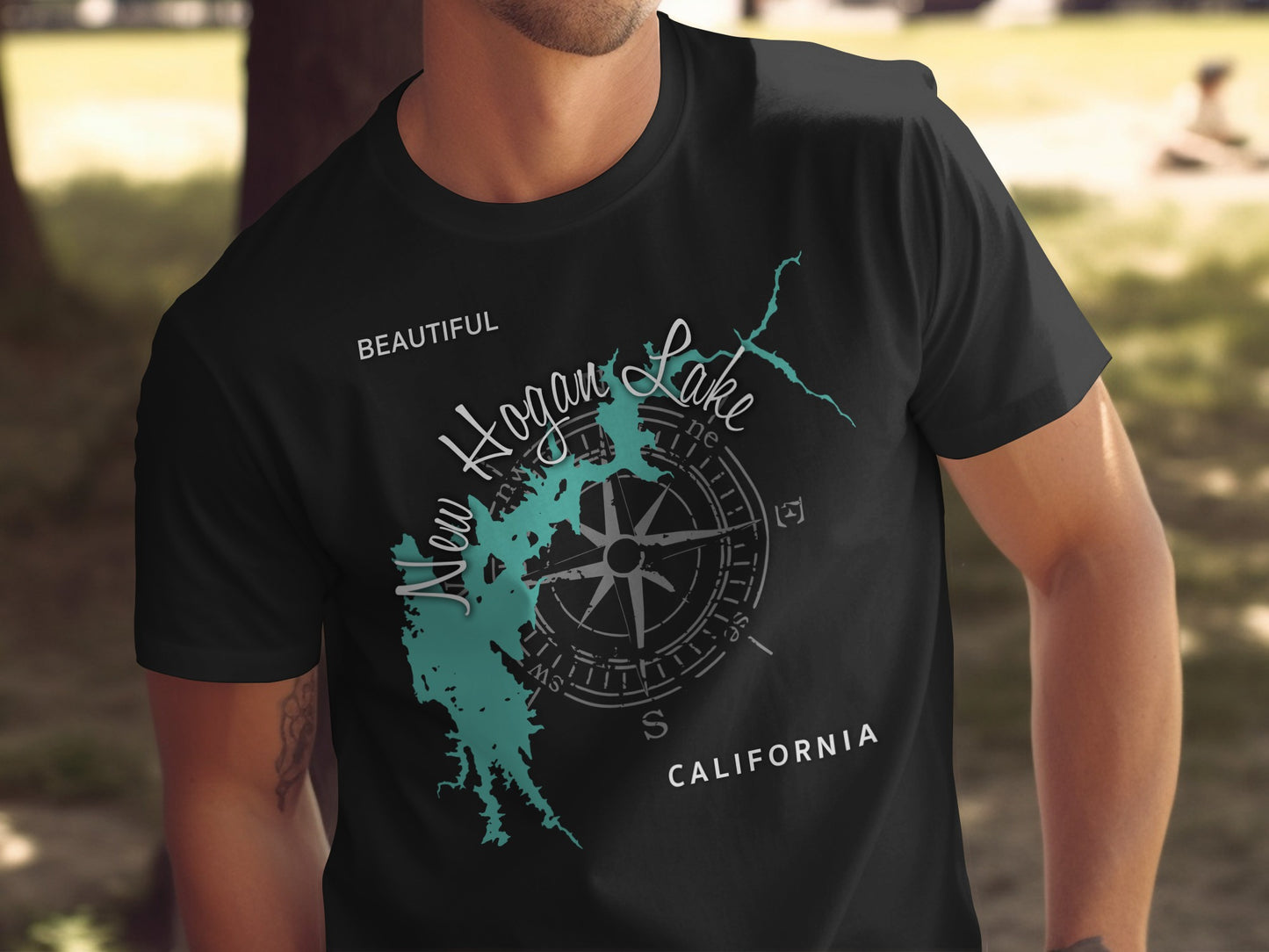 Black t-shirt with "Beautiful New Hogan Lake California" map and compass design.