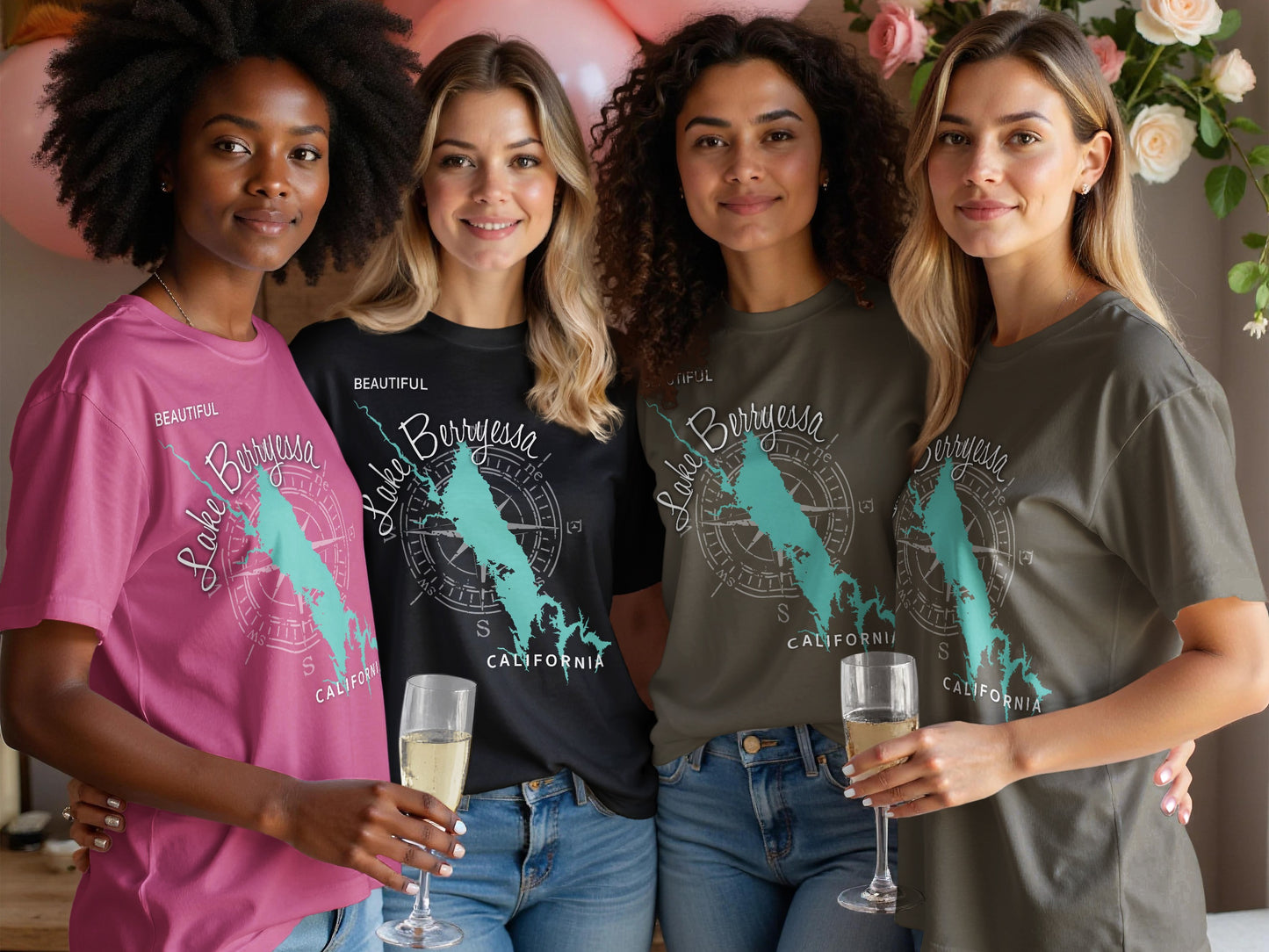 Four women wearing t-shirts with Lake Berryessa design and "CALIFORNIA" text.