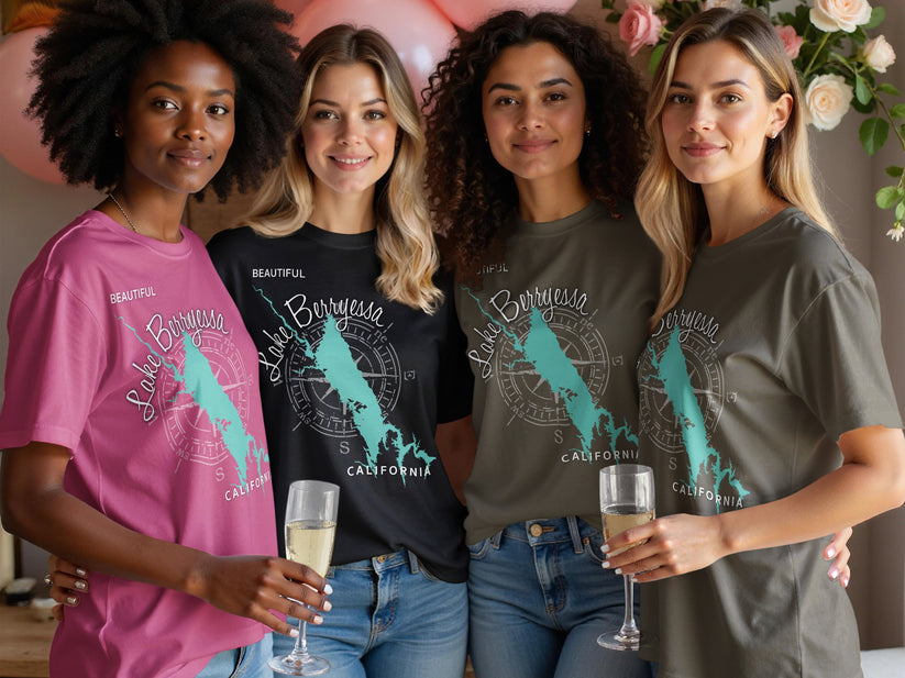 Four women wearing t-shirts with Lake Berryessa design and "CALIFORNIA" text.