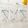 Three clear glasses with "DON PEDRO ISLAND FLORIDA" and compass designs.