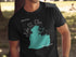 Black t-shirt with teal Lake St. Clair map and "Beautiful Michigan" text.