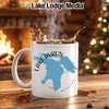 White mug with Lake Huron map graphic and "Lake Lodge Media" logo.