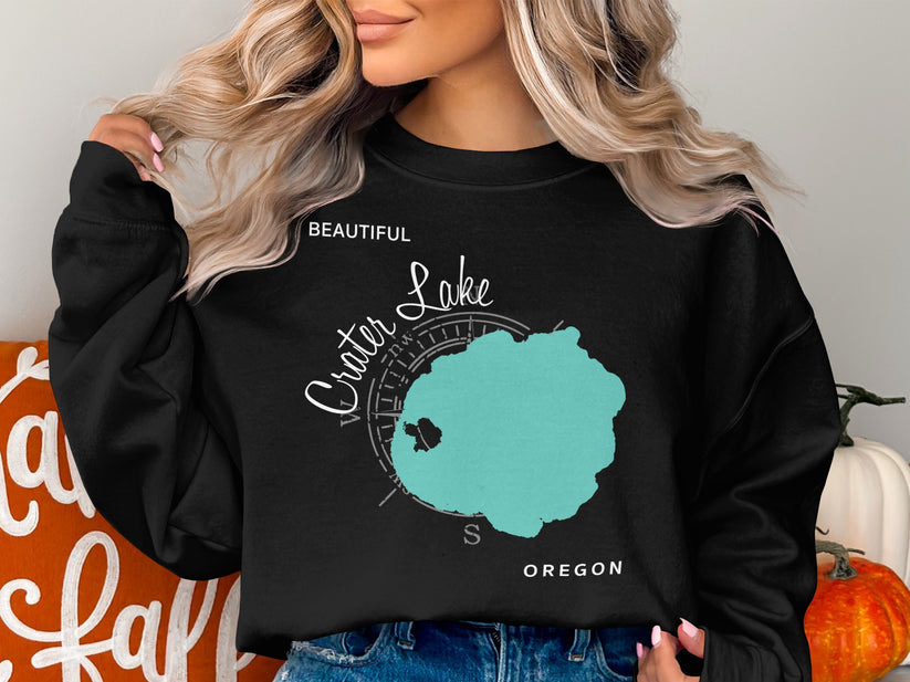 Black sweatshirt with "Beautiful Crater Lake Oregon" graphic in teal and white.
