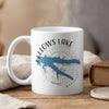 White mug with Fellows Lake, Missouri design and compass graphic.
