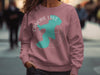 Pink sweatshirt with Canobie Lake, New Hampshire graphic and compass rose.